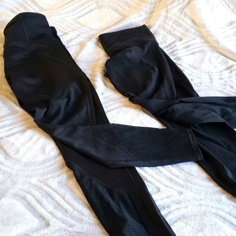 2 pairs Athleta black leggings.